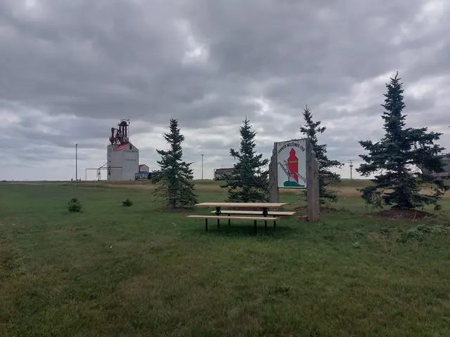 Welcome sign and grain elevator