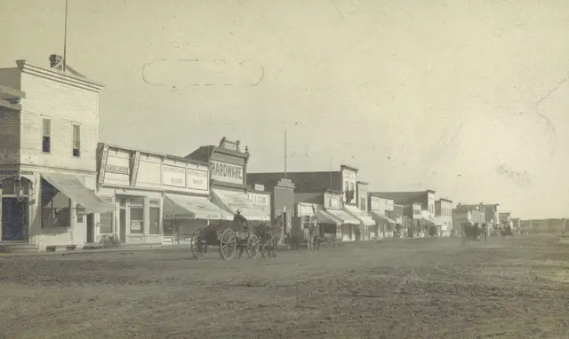 Main Street with horse-drawn wagons