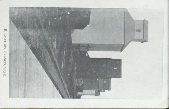 Grain elevators beside the railway tracks